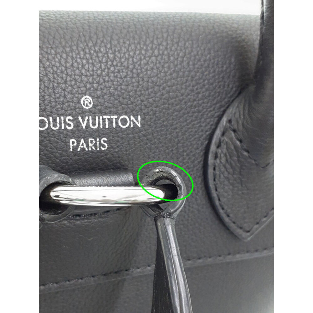 Louis Vuitton Lock Me Backpack - Picture 6 of 9
